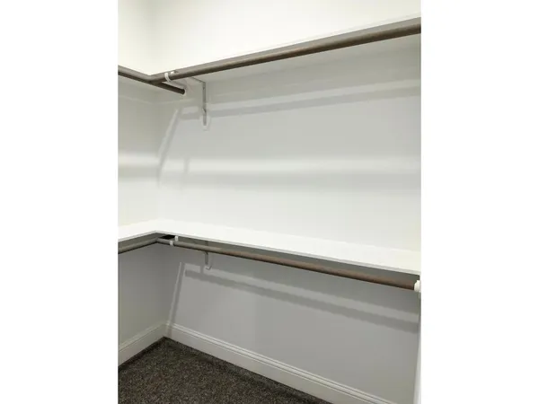 a view of an empty room with empty racks