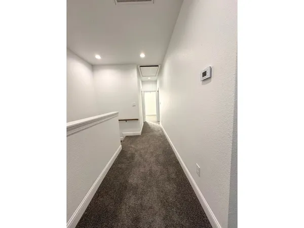 a view of a ceiling fan in a bathroom