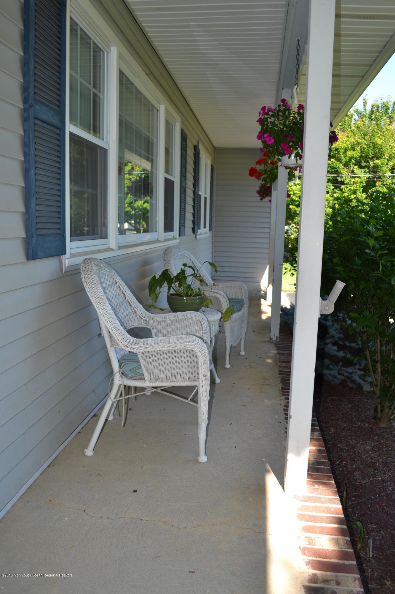 13 Elmore Road Freehold, NJ 07728 - Photo 2 of 23 Covered Porch