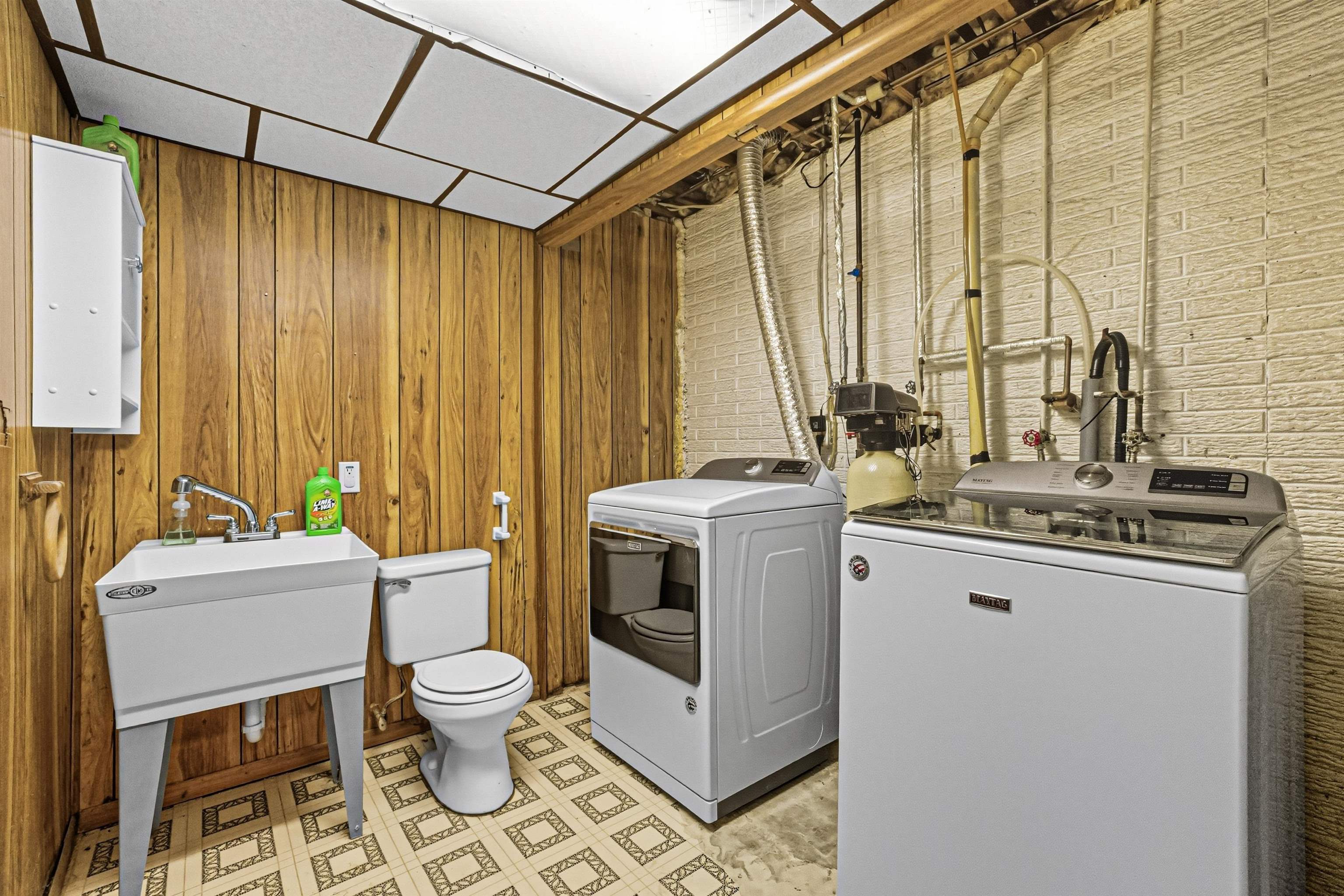 2124 West Middlebury Road Freeport, IL 61032 - Photo 14 of 23 a view of bathroom with a sink a toilet and a mirror
