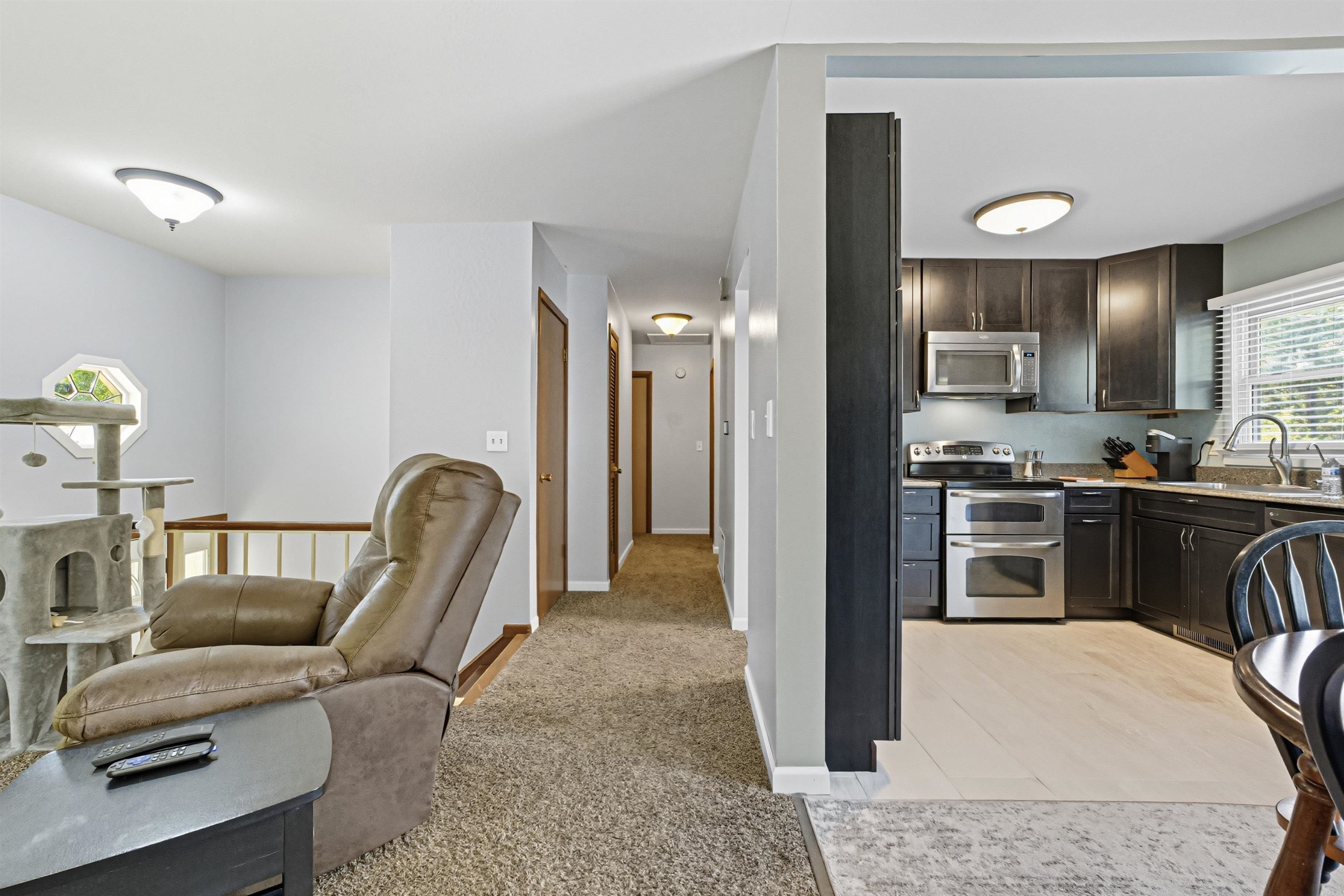 2124 West Middlebury Road Freeport, IL 61032 - Photo 19 of 23 a kitchen with a refrigerator and a sink