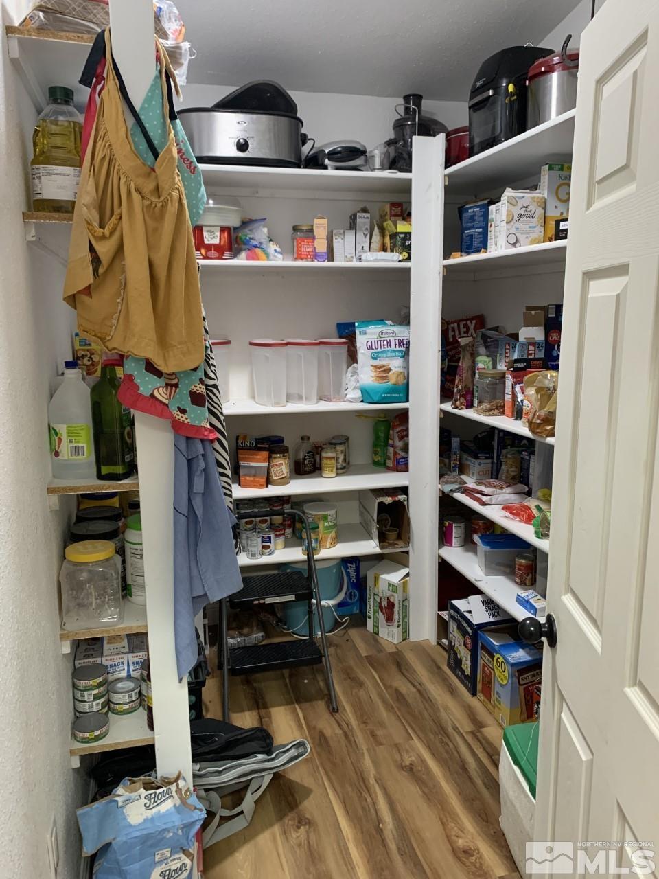 450 Reservoir Road Lovelock, NV 89419 - Photo 11 of 37 a view of walk in closet with clothes and shoes