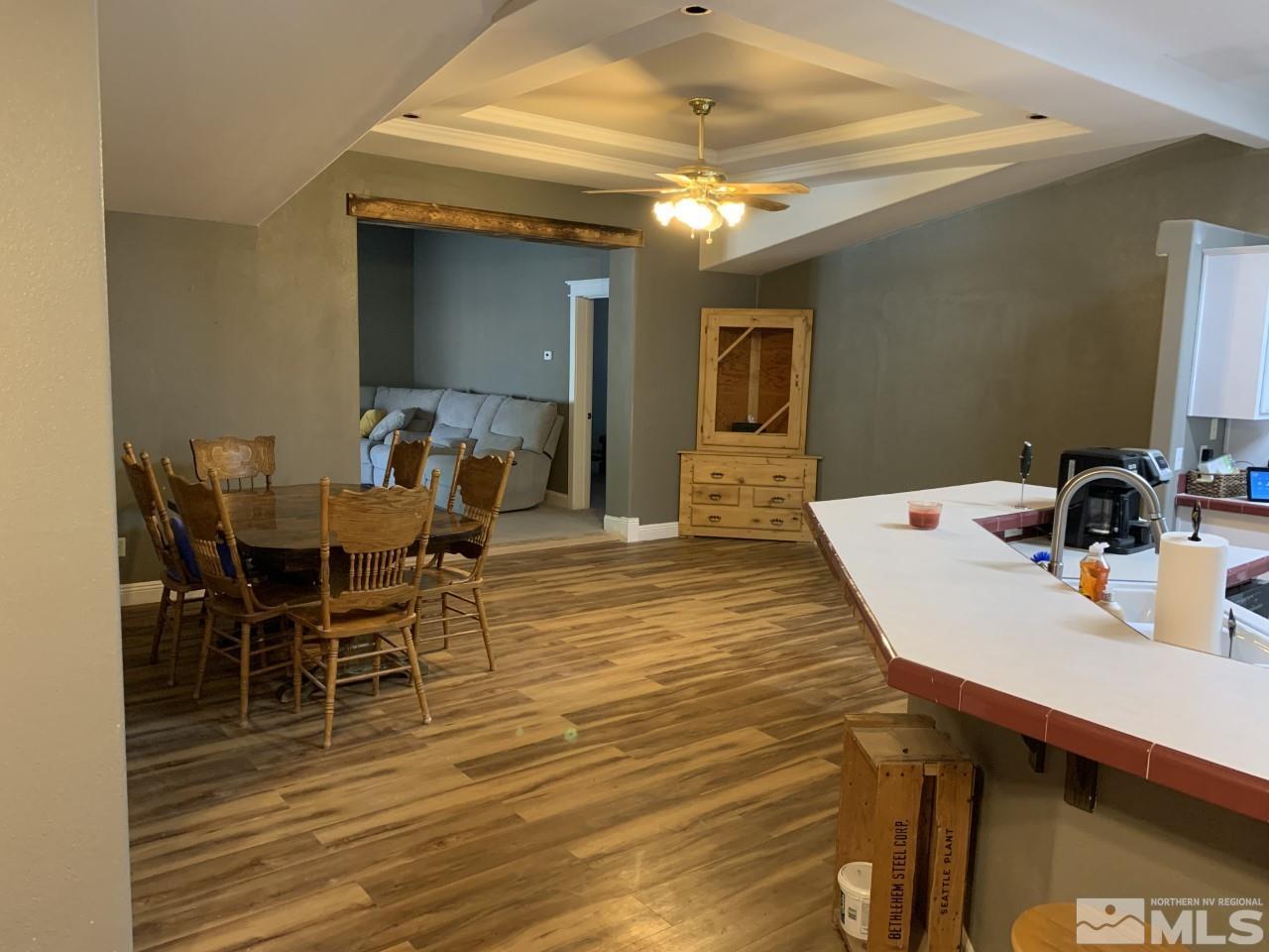 450 Reservoir Road Lovelock, NV 89419 - Photo 12 of 37 a view of a dining room with furniture and chandelier