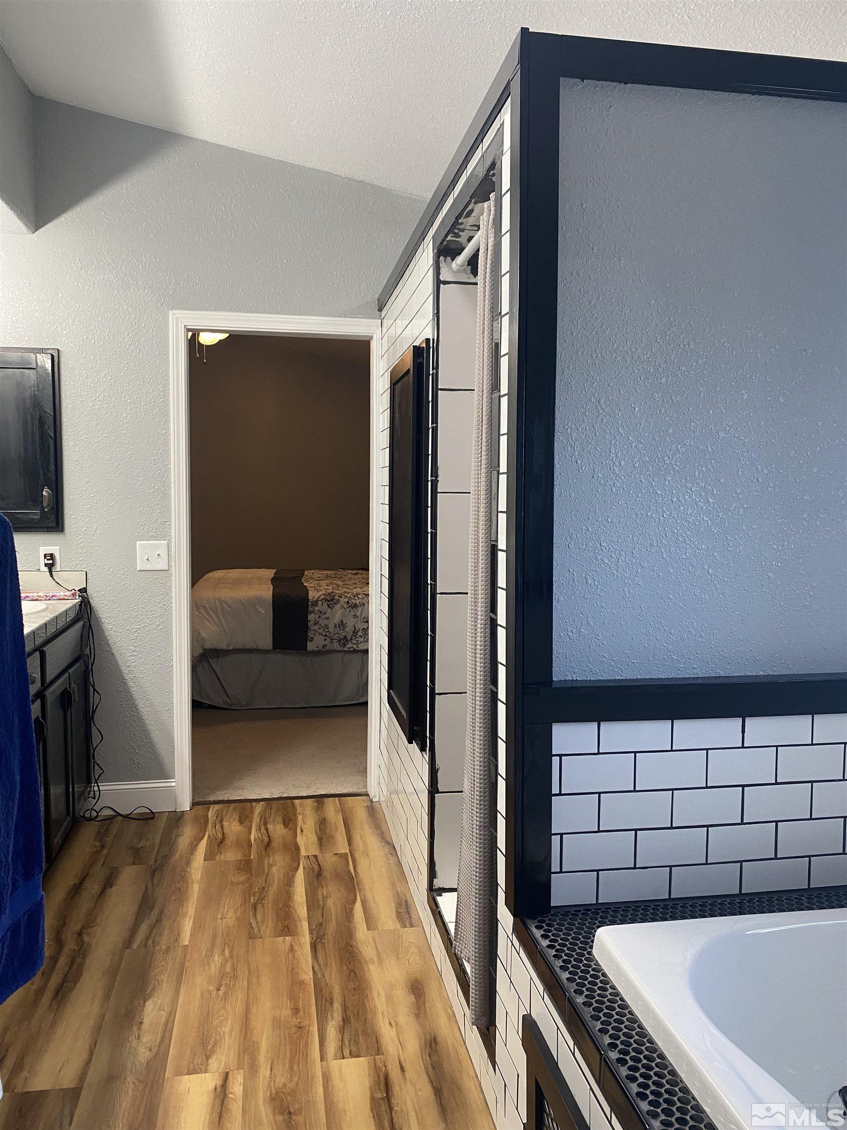 450 Reservoir Road Lovelock, NV 89419 - Photo 24 of 37 a bathroom with a bathtub and a sink