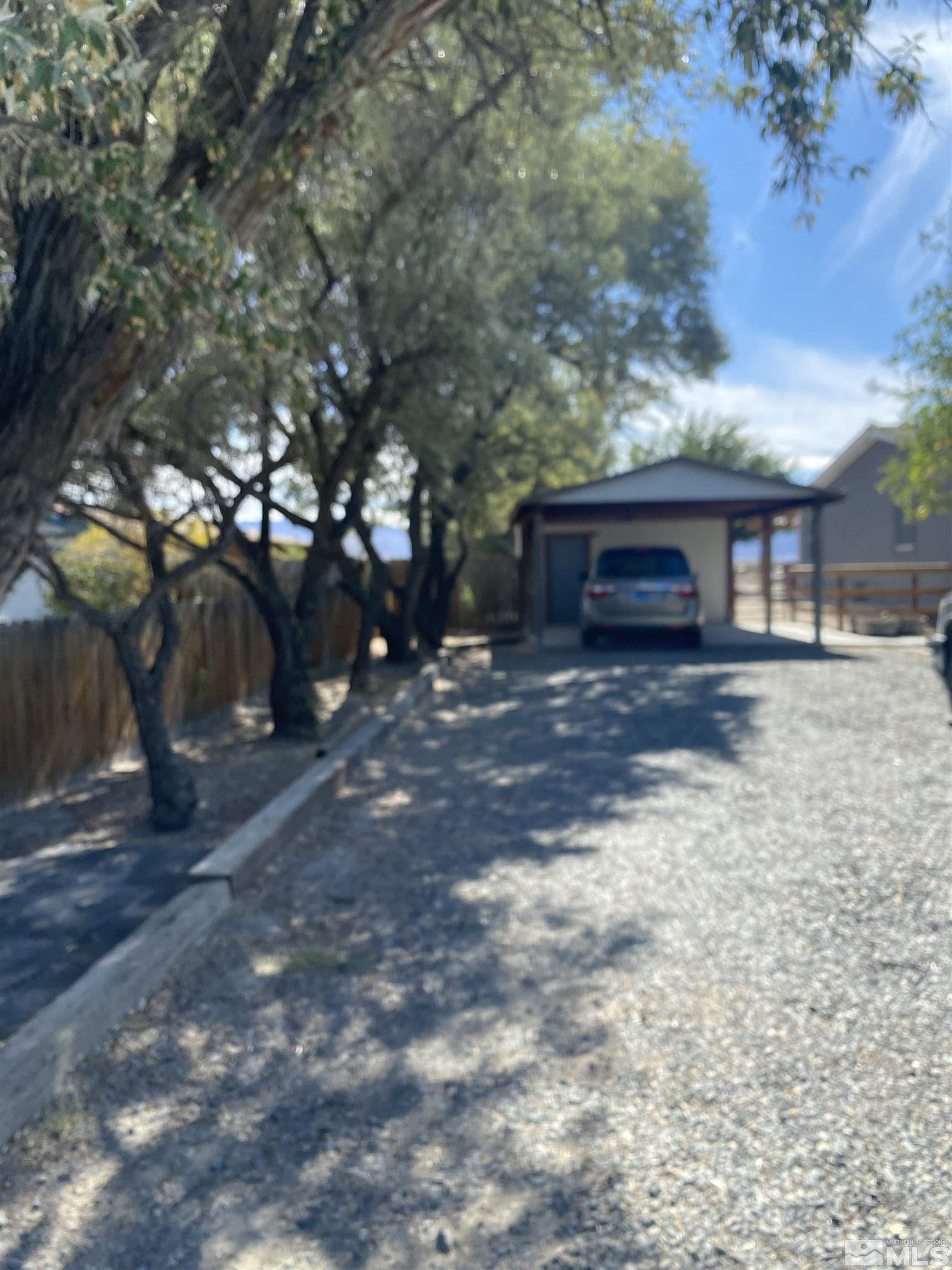 450 Reservoir Road Lovelock, NV 89419 - Photo 34 of 37 a view of a house with a yard