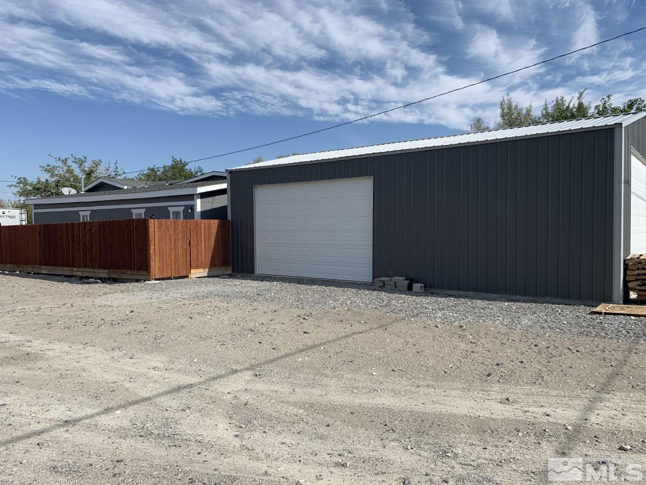 450 Reservoir Road Lovelock, NV 89419 - Photo 5 of 37 a backyard of a house