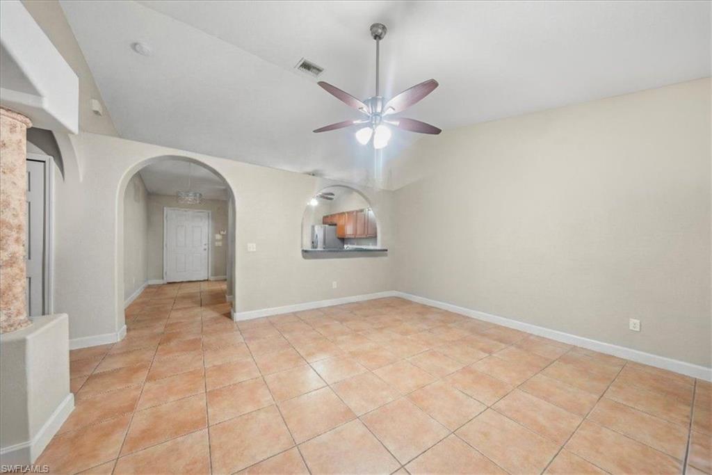 4438 Pine Lake Road Bonita Springs, FL 34134 - Photo 3 of 33 an empty room with fan and windows
