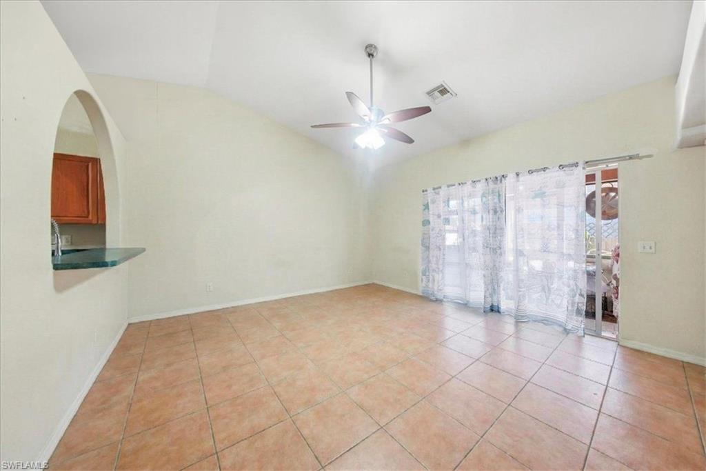 4438 Pine Lake Road Bonita Springs, FL 34134 - Photo 4 of 33 a view of an empty room with a window