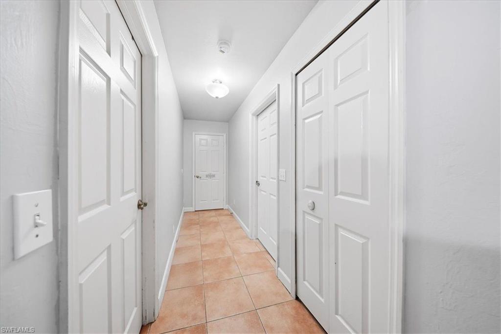 4438 Pine Lake Road Bonita Springs, FL 34134 - Photo 9 of 33 a view of a hallway