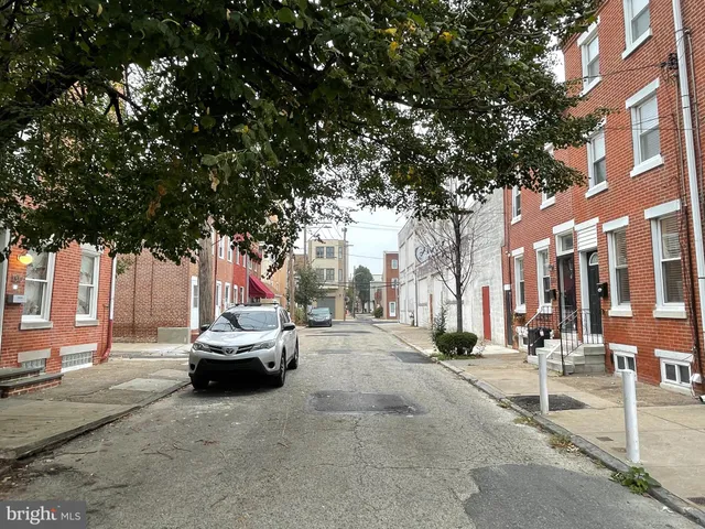 a car parked on the side of a street