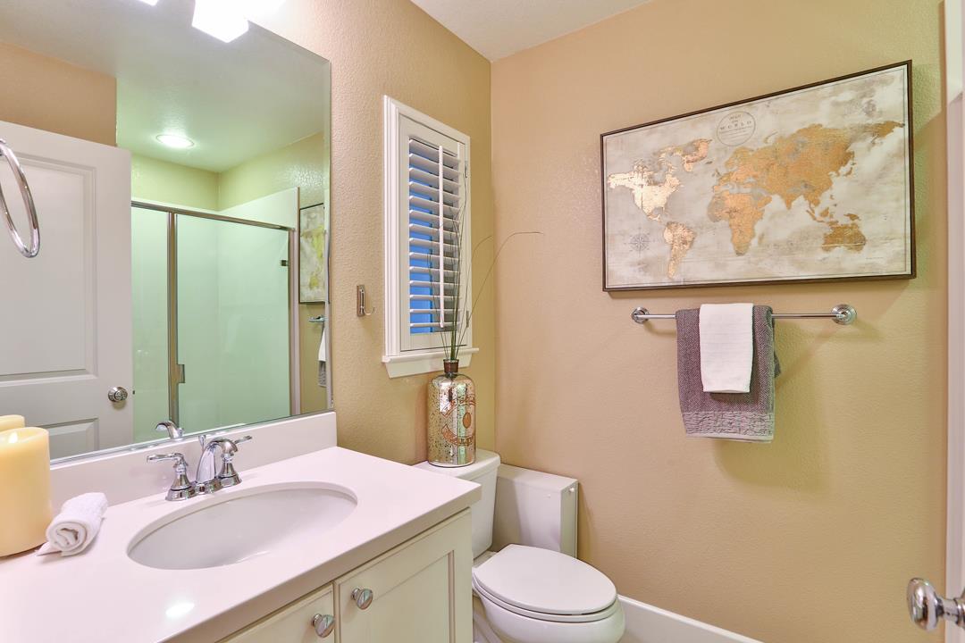 103 Savannah Loop Mountain View, CA 94043 - Photo 11 of 35 a bathroom with a sink mirror and toilet