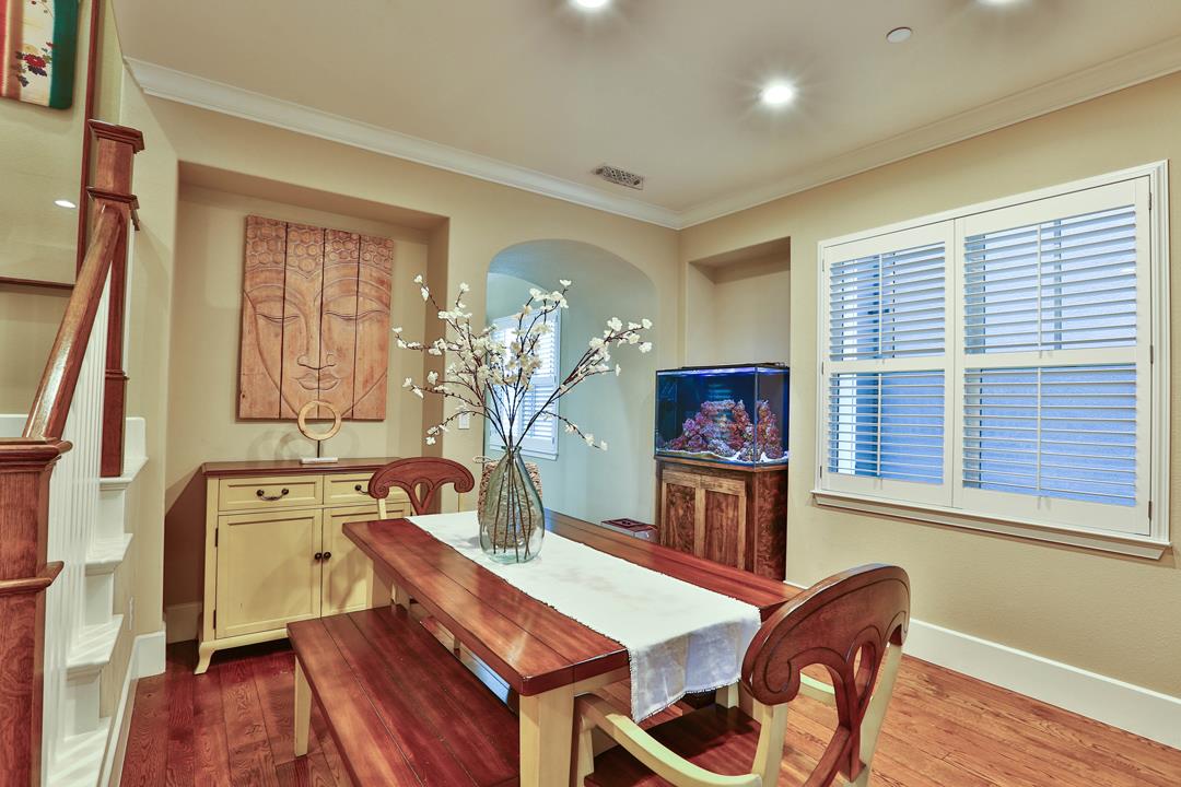 103 Savannah Loop Mountain View, CA 94043 - Photo 13 of 35 a view of a dining room with furniture window and wooden floor