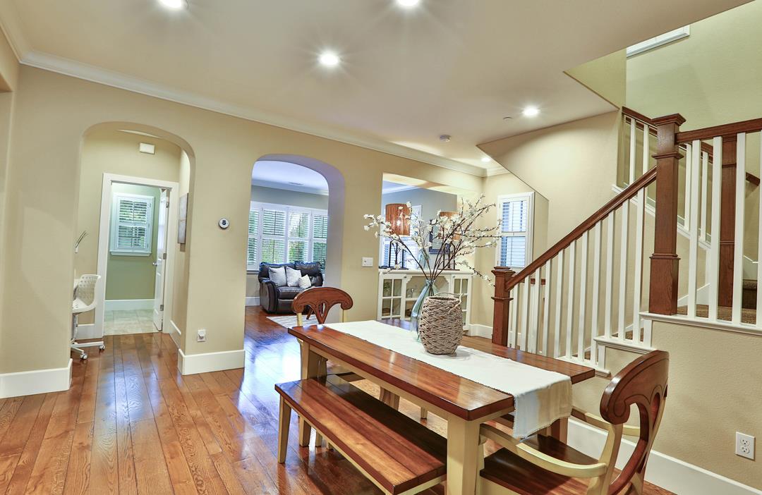 103 Savannah Loop Mountain View, CA 94043 - Photo 15 of 35 a view of a dining room with furniture and wooden floor