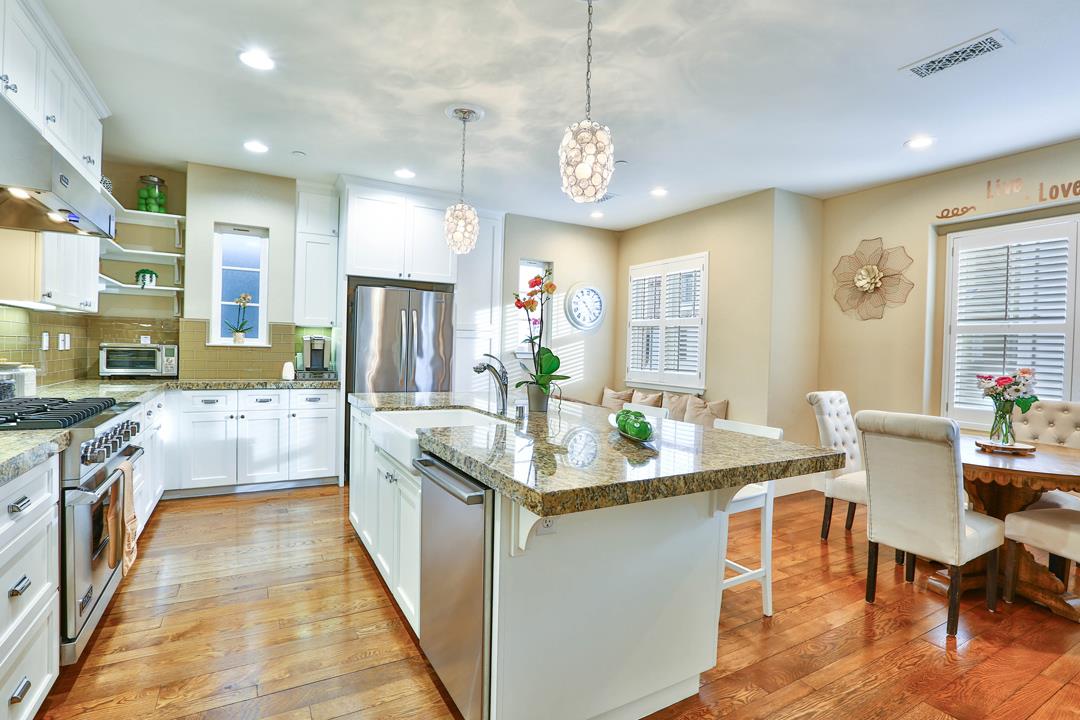 103 Savannah Loop Mountain View, CA 94043 - Photo 16 of 35 a large kitchen with kitchen island a large island in it