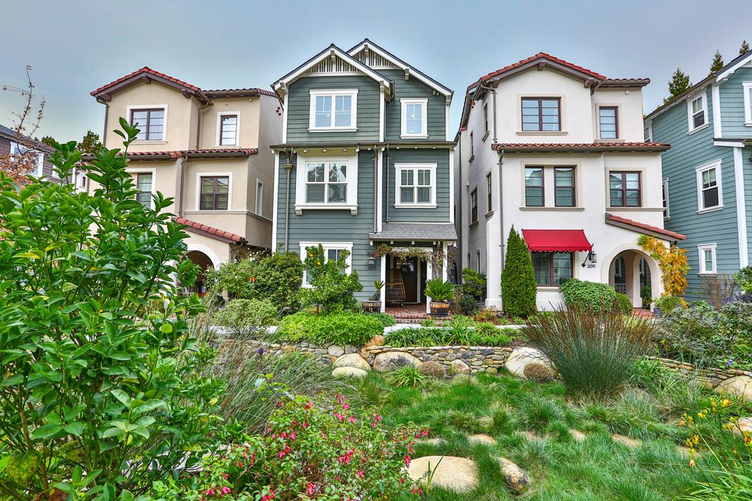 103 Savannah Loop Mountain View, CA 94043 - Photo 2 of 35 a front view of a residential houses with yard and green space