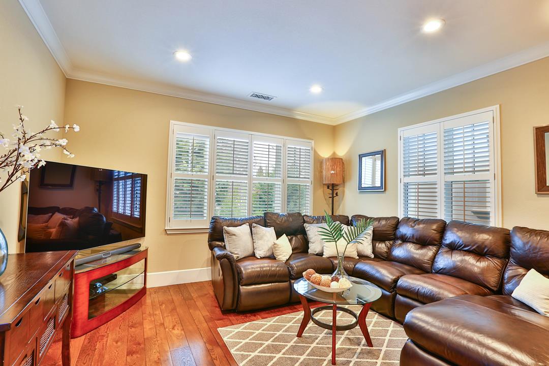 103 Savannah Loop Mountain View, CA 94043 - Photo 23 of 35 a living room with furniture and a flat screen tv