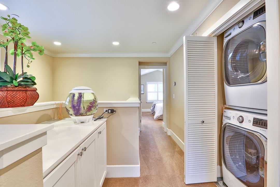 103 Savannah Loop Mountain View, CA 94043 - Photo 25 of 35 a view of a hallway with washer and dryer