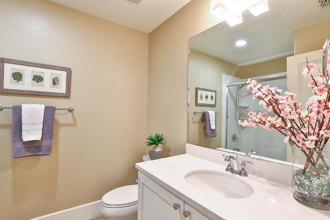 103 Savannah Loop Mountain View, CA 94043 - Photo 26 of 35 a bathroom with a sink toilet and vanity