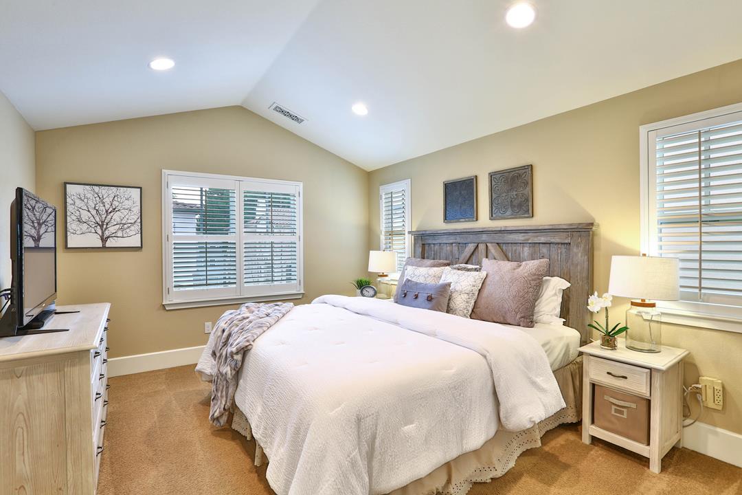 103 Savannah Loop Mountain View, CA 94043 - Photo 29 of 35 a bedroom with a bed and wooden floor