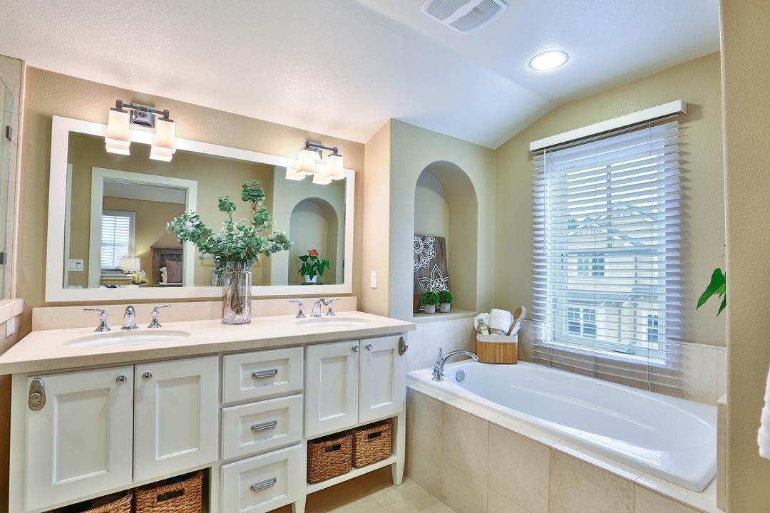 103 Savannah Loop Mountain View, CA 94043 - Photo 32 of 35 a bathroom with a sink a large mirror and a window