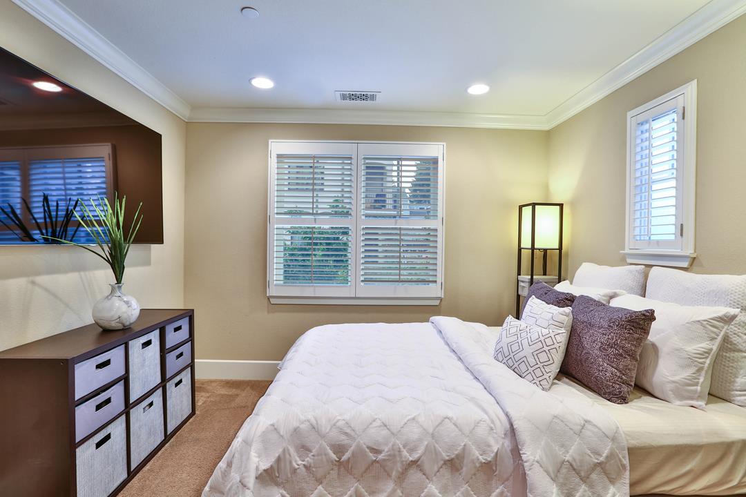 103 Savannah Loop Mountain View, CA 94043 - Photo 10 of 35 a bedroom with a large bed and a window