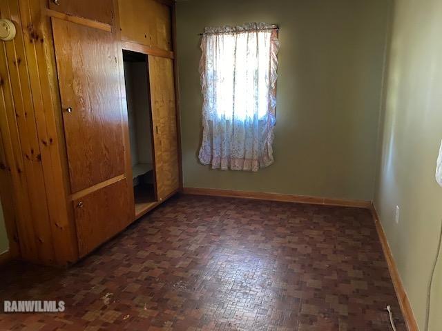 6389 C Riverview Road Thomson, IL 61285 - Photo 13 of 16 an empty room with windows