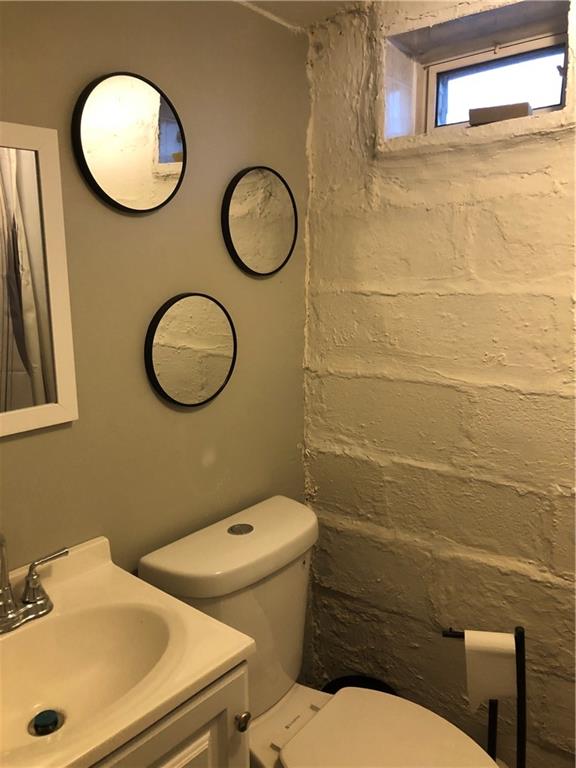 144 Grandview Way Charleroi, PA 15022 - Photo 12 of 17 a bathroom with a sink mirror and toilet