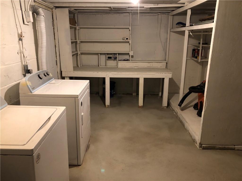 144 Grandview Way Charleroi, PA 15022 - Photo 14 of 17 a room with cabinets and a refrigerator