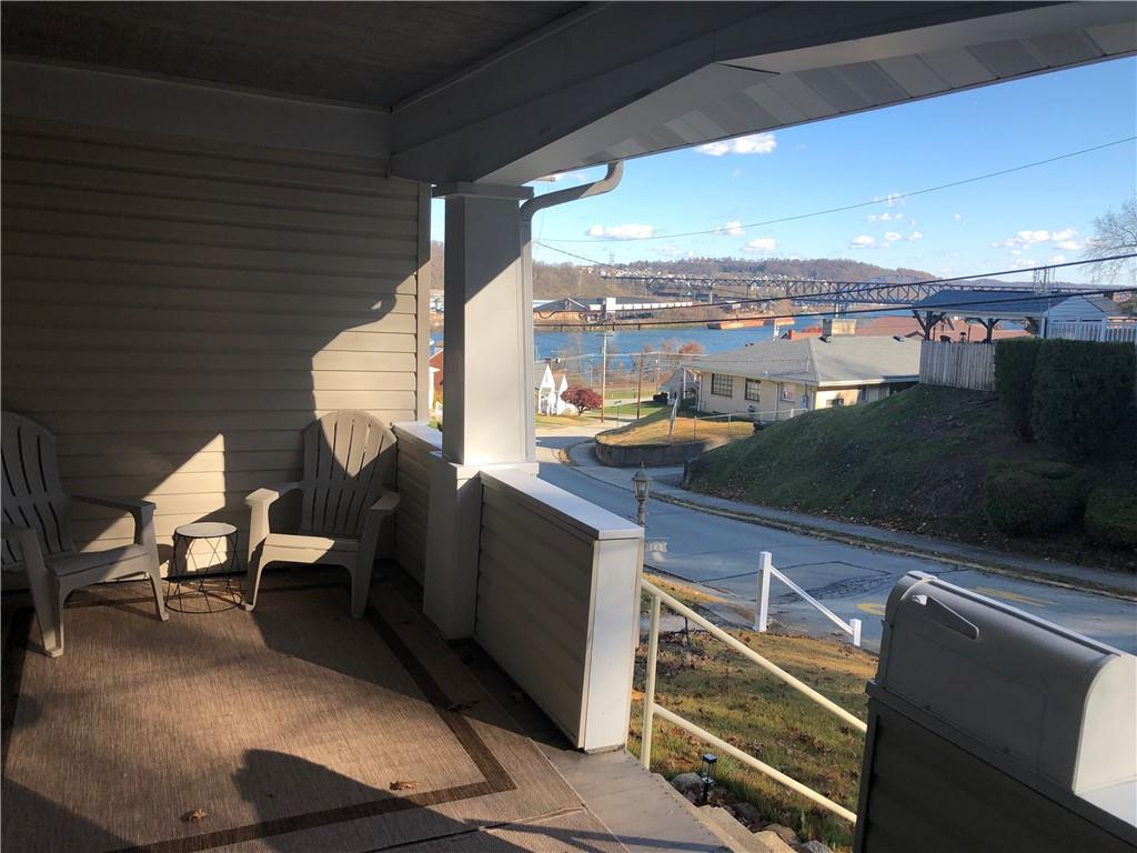 144 Grandview Way Charleroi, PA 15022 - Photo 2 of 17 a view of a chairs and table in the balcony
