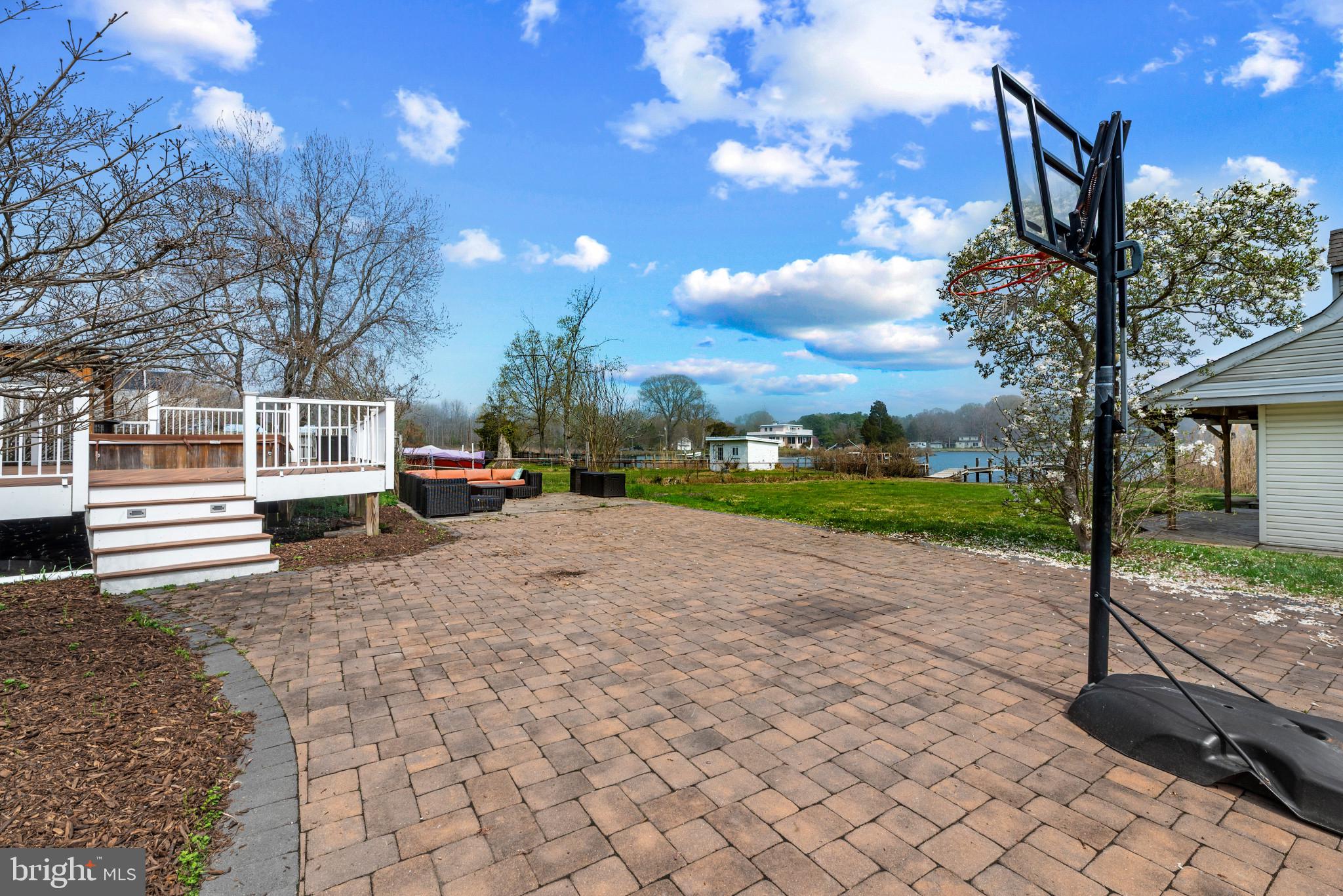 5929 Deale Beach Road Deale, MD 20751 - Photo 45 of 58 View of patio with a wooden deck and outdoor loung