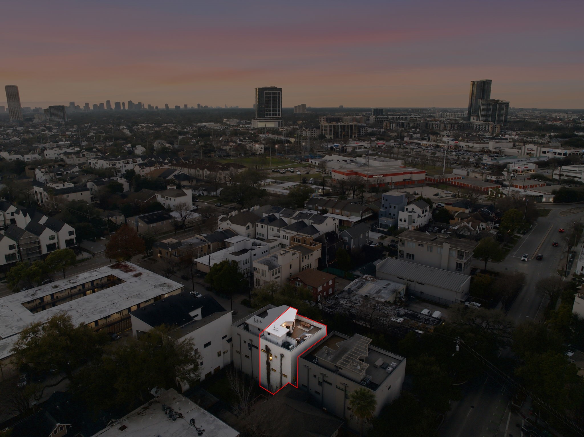 1405 Vermont Street, Unit A Houston, TX 77006 - Photo 43 of 46 Perched within the vibrant Bradford Mews, 1405 Vermont Street #A boasts a premier Inner Loop location with an illuminated rooftop deck and a private driveway. This luxury 3-story contemporary residence features sleek stucco and siding, offering a low-maintenance lifestyle minutes from Downtown, the Medical Center, and top-tier dining. Expansive windows and multiple balconies highlight the sophisticated architectural design, while a new roof and updated HVAC ensure long-term value.