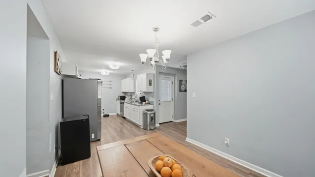 a view of a kitchen with a sink