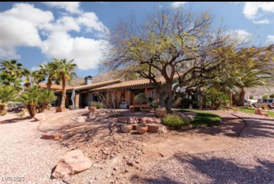 440 Probst Way Las Vegas, NV 89110 - Photo 12 of 42 Rear view of house featuring a pergola and a patio area