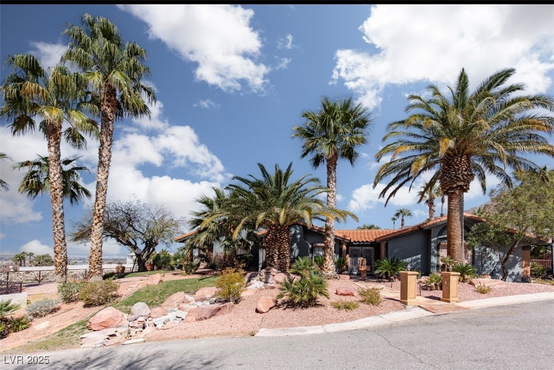 440 Probst Way Las Vegas, NV 89110 - Photo 2 of 42 View of front of house with a tiled roof and stucco siding