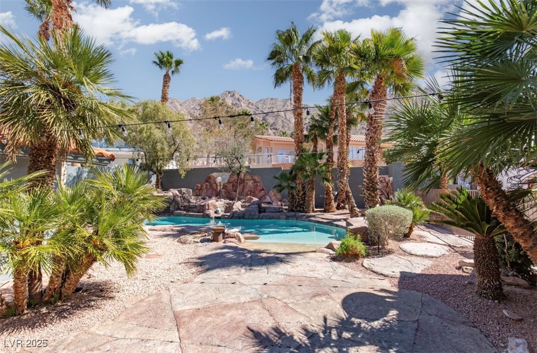 440 Probst Way Las Vegas, NV 89110 - Photo 42 of 42 View of pool with a mountain view and a patio area