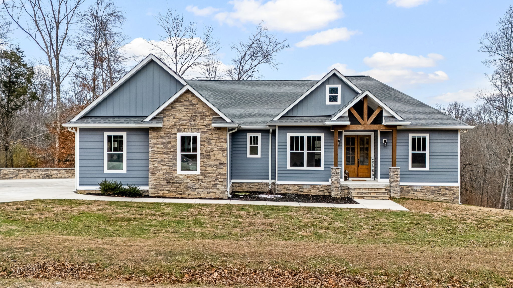 1689 Ridgeview Run Lynchburg, TN 37352 - Photo 2 of 67 a front view of a house with yard