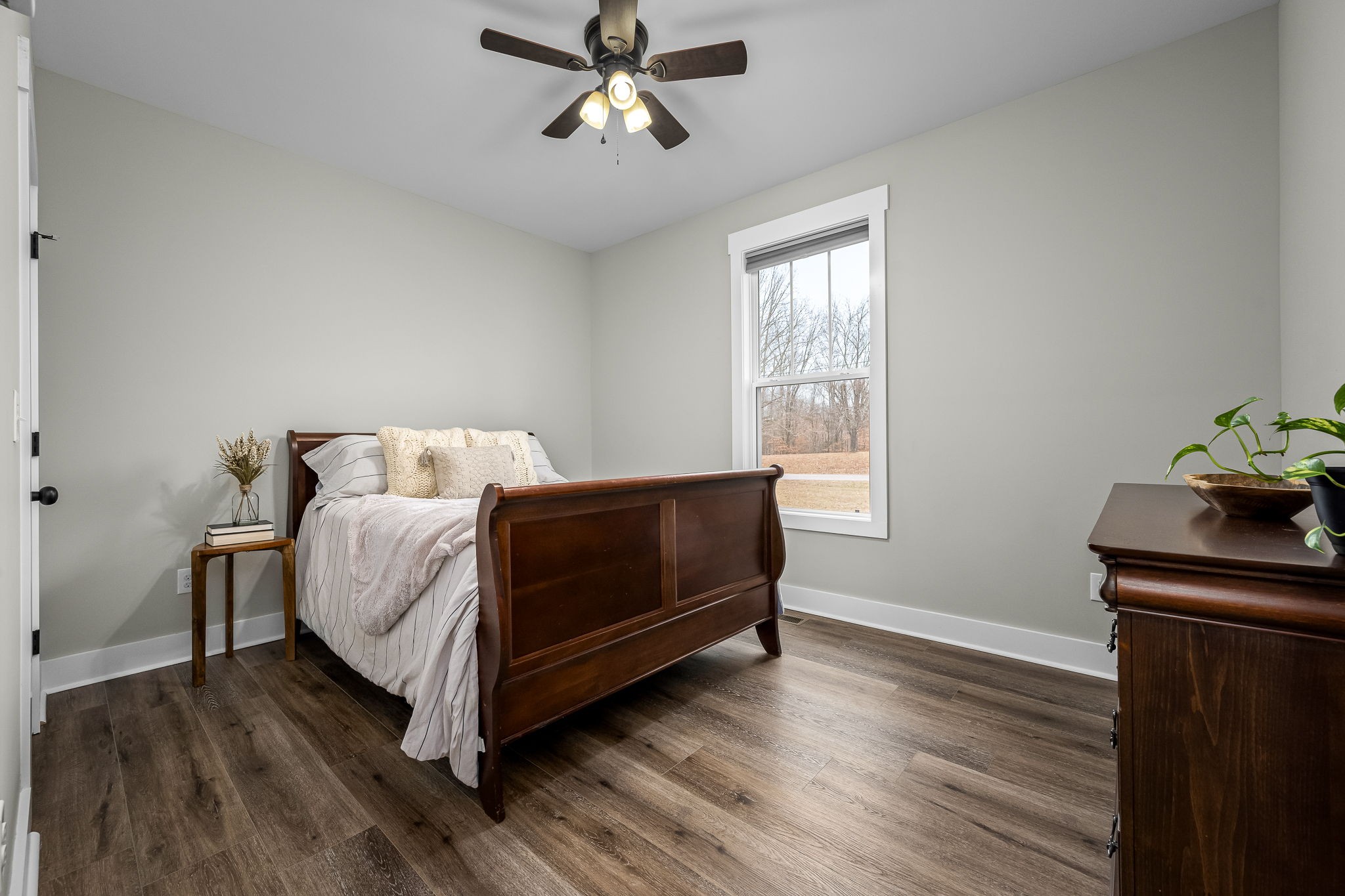 1689 Ridgeview Run Lynchburg, TN 37352 - Photo 36 of 67 a bedroom with a bed and wooden floor