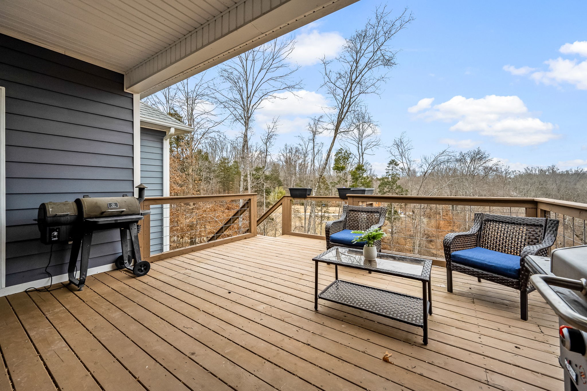 1689 Ridgeview Run Lynchburg, TN 37352 - Photo 44 of 67 a view of a roof deck with wooden floor and outdoor seating