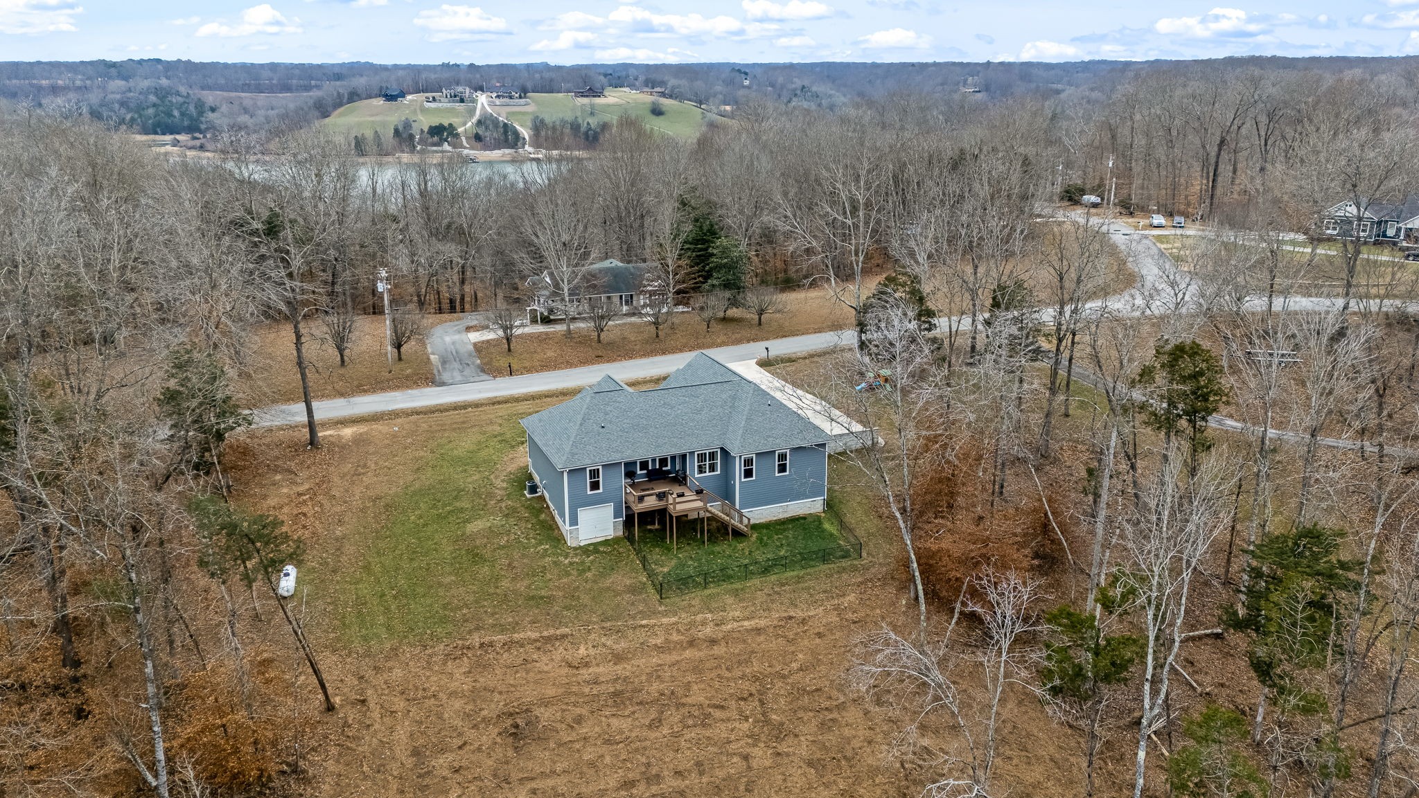 1689 Ridgeview Run Lynchburg, TN 37352 - Photo 51 of 67 a view of a house with a yard and sitting area