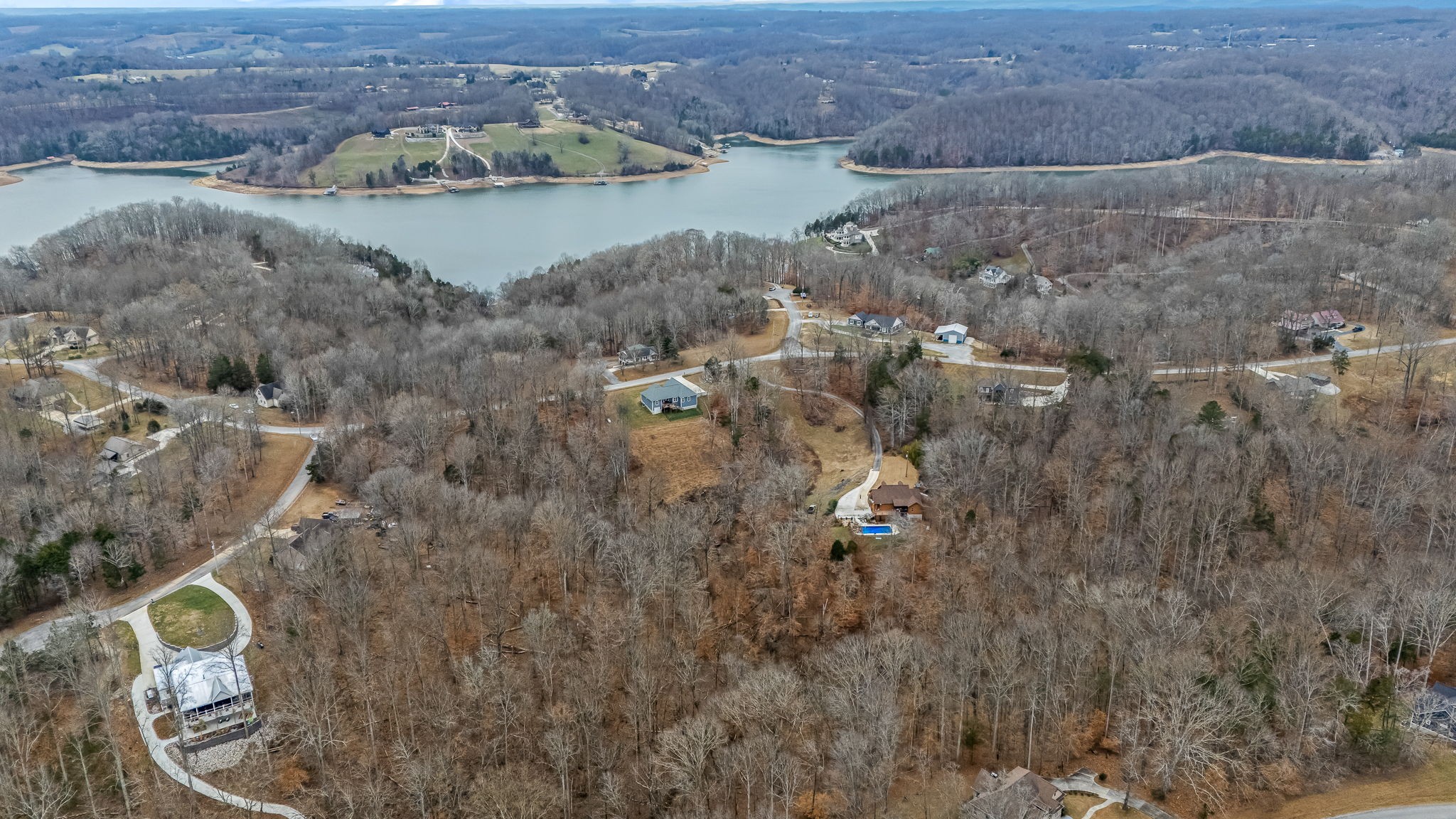 1689 Ridgeview Run Lynchburg, TN 37352 - Photo 60 of 67 a aerial view of a house with a yard and lake view
