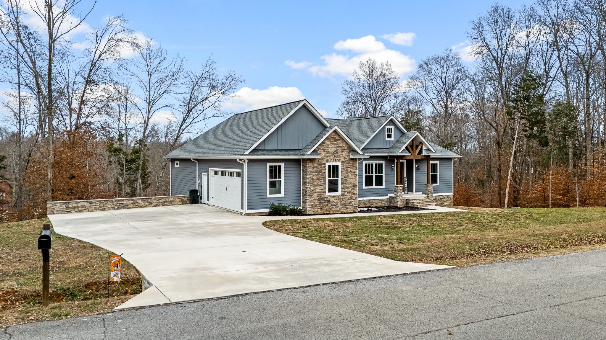 1689 Ridgeview Run Lynchburg, TN 37352 - Photo 7 of 67 a front view of a house with a yard