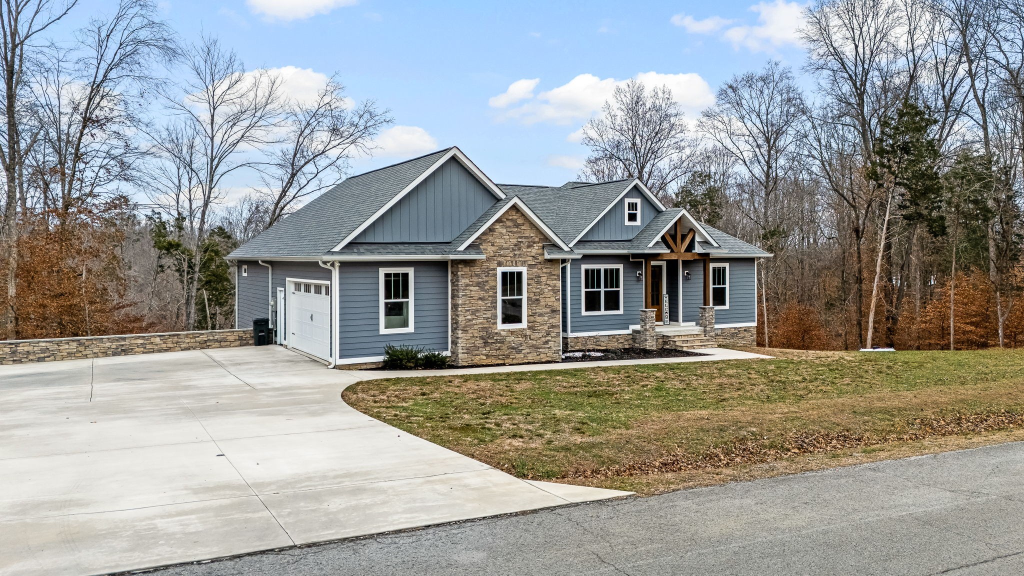1689 Ridgeview Run Lynchburg, TN 37352 - Photo 8 of 67 a front view of a house with a yard