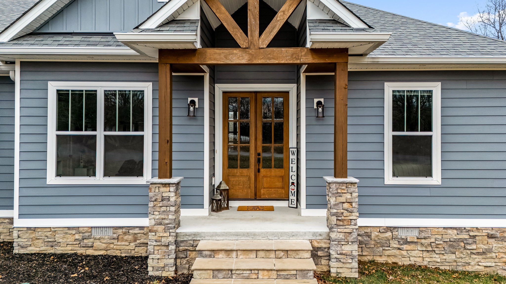 1689 Ridgeview Run Lynchburg, TN 37352 - Photo 10 of 67 a front view of a house with large windows