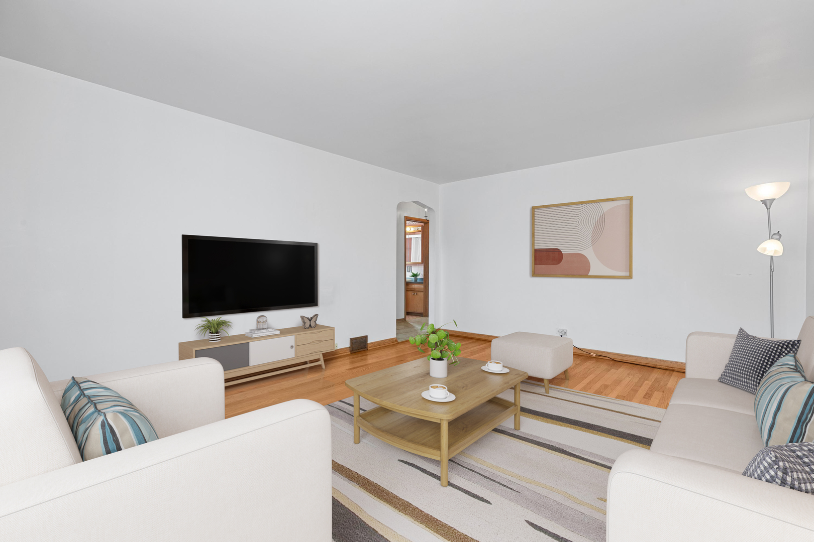 2204 Hainsworth Avenue North Riverside, IL 60546 - Photo 3 of 17 a living room with furniture and a flat screen tv