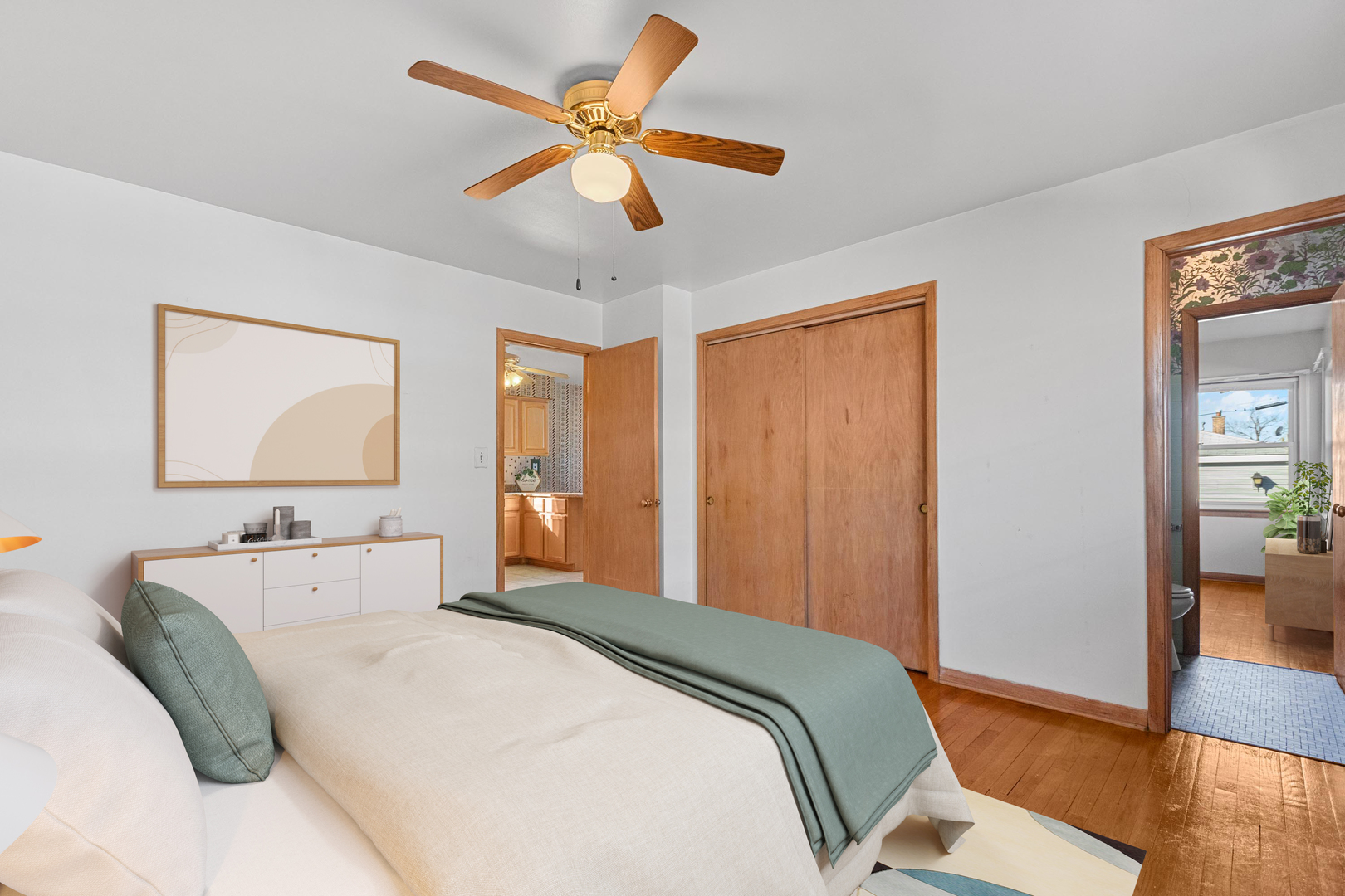 2204 Hainsworth Avenue North Riverside, IL 60546 - Photo 9 of 17 a bedroom with a large bed and a chandelier