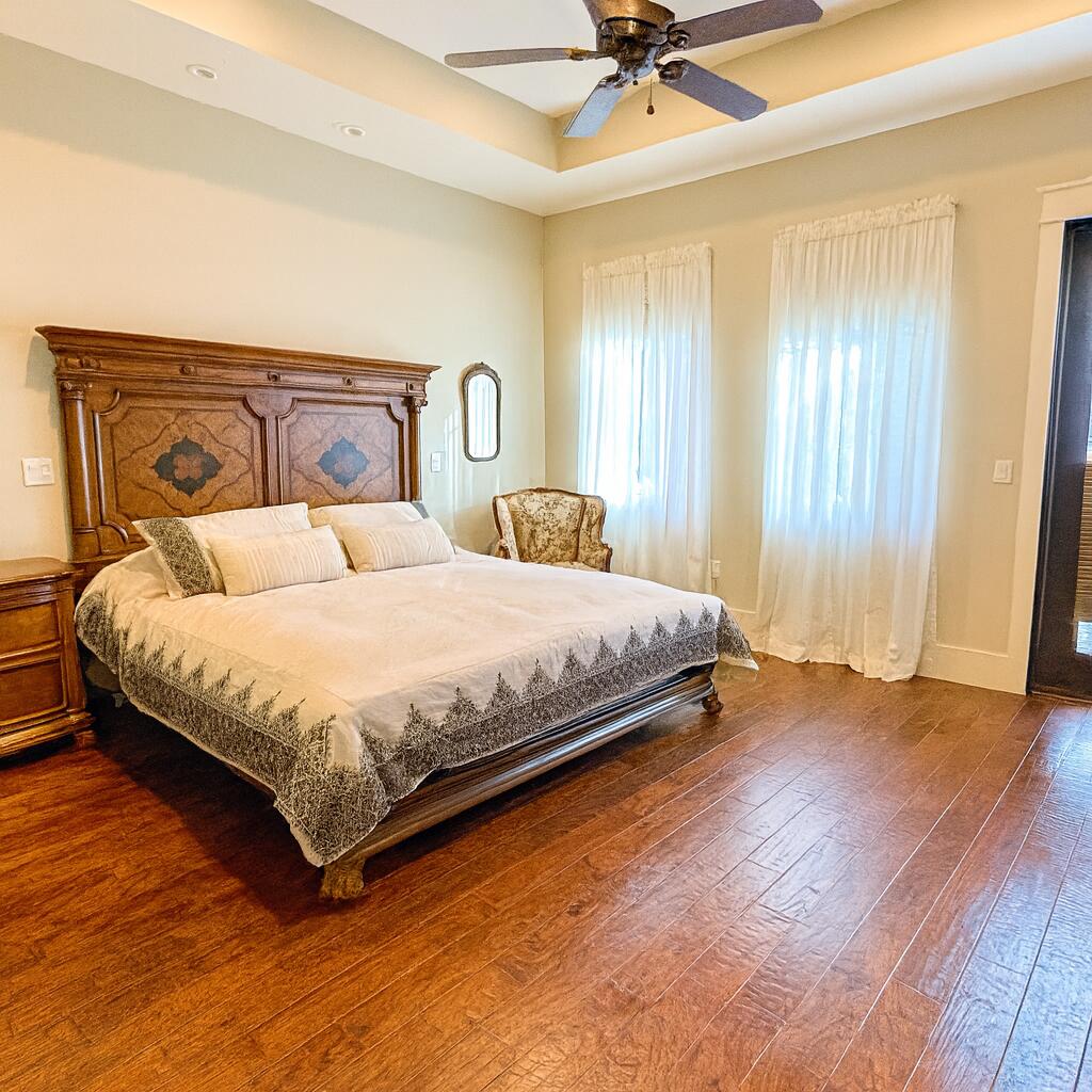 22 Grand Flora Way Santa Rosa Beach, FL 32459 - Photo 5 of 13 a bedroom with a bed and window