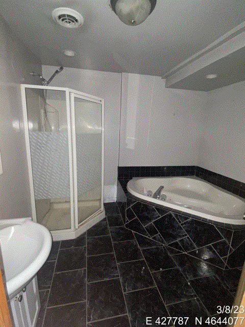 3638 Ruby Street Franklin Park, IL 60131 - Photo 8 of 8 a bathroom with a shower and a sink