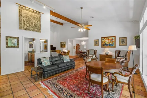 a view of a livingroom with furniture and a rug