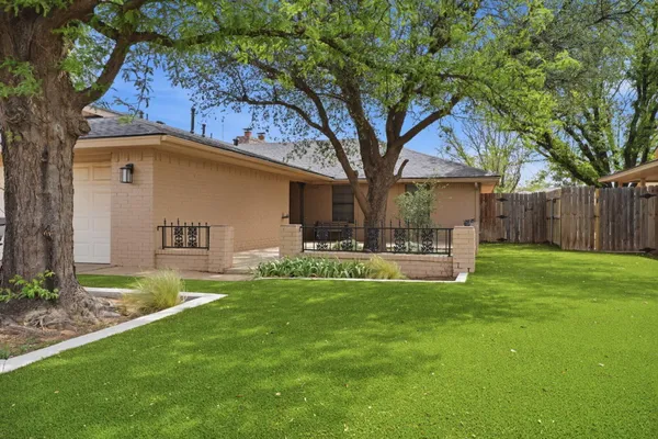 a front view of a house with patio