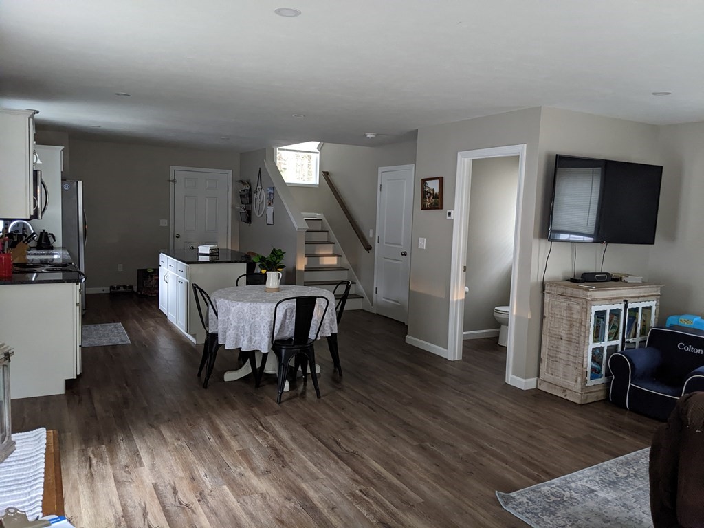 12 Watatic Road Rindge, NH 03461 - Photo 3 of 10 a dining room with furniture and wooden floor